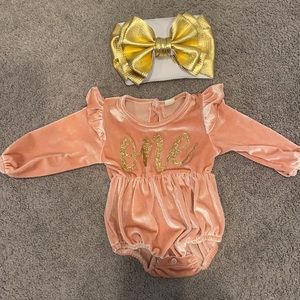 Worn once. Washed. Includes only bow and romper